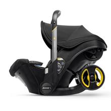 Siège-Auto et Poussette Doona™