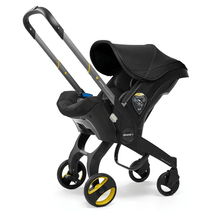 Siège-Auto et Poussette Doona™