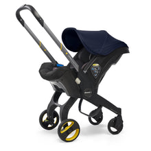 Siège-Auto et Poussette Doona™